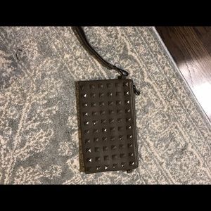 Grey leather large wristlet with metal studs
